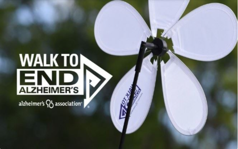 Walk to End Alzeheimer's banner with white Alzheimer's flower