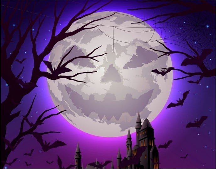 jack-o'-lantern moon with castle, bats, and trees