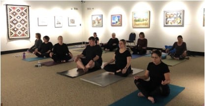 Photo of people doing yoga