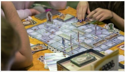 photo of people playing a board game