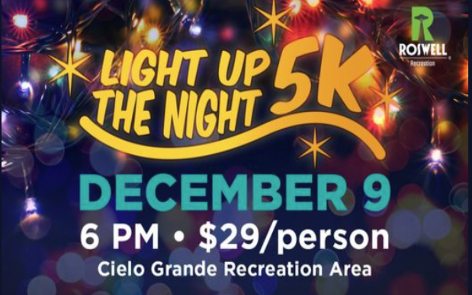 Light Up the Night 5k text pictured in front of night time lights event image