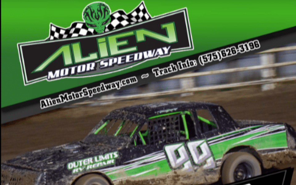An image of a racecar on a dirt track pictured with the Alien Motor Speedway Logo