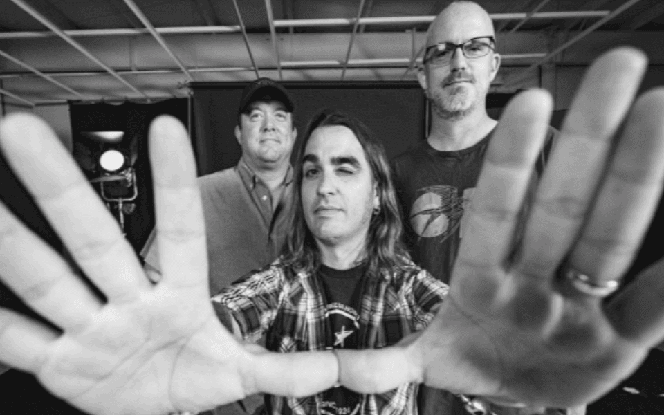 Cody Canada and The Departed pictured in a black and white photograph facing the camera.